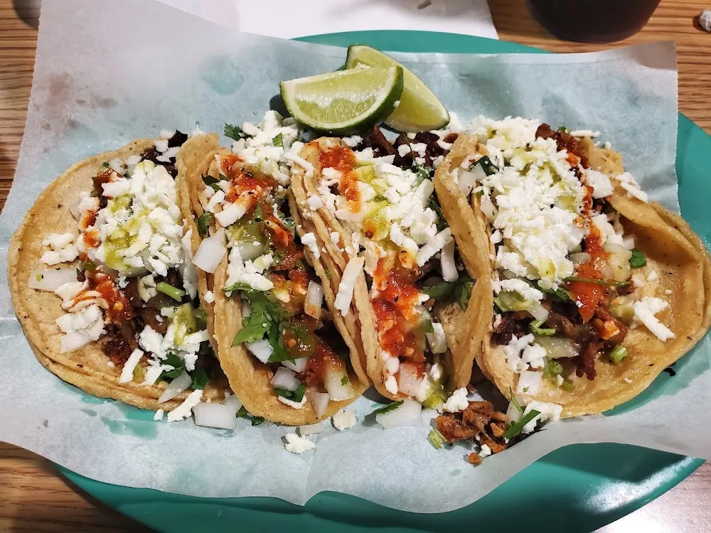 Pork Tacos w Cilantro Onion Cheese on Corn Tortillas